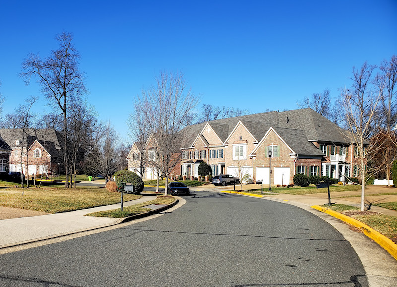 typical American residential neighborhood, rows of single-family multi-level homes. USA real estate